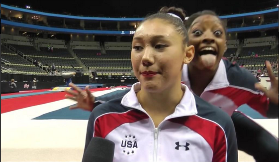 Simone Biles videobombs Kyla Ross's interview with USA Gymnastics.
